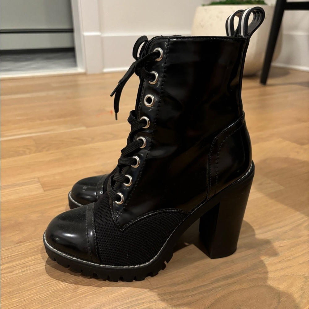BCBG Pilas lace up bootie black sz 7.5. Worn once